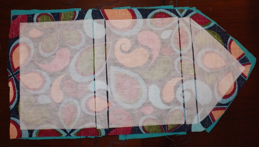 Outer fabric with interfacing pieces attached.